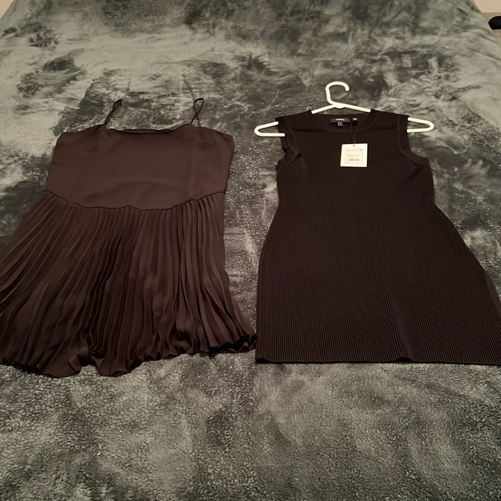 Theory black sweater dress with side slit and ruffle skirt underneath. NWT